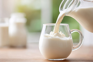 Pouring fresh milk into a glass mug, a Food & Drink Photo by AlyaAnd
