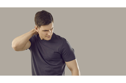 Young unhappy muscular man suffers, a Person Photo by StudioRomantic