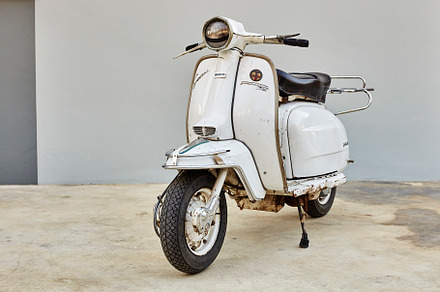 Scooter Lambretta vintage motorcycle, a Background Photo by 1981 Rustic studio kan