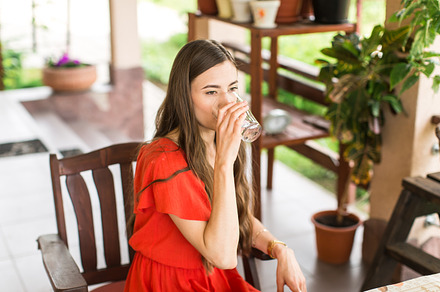 Woman is drinking glass of water featuring water, drinking, and glass, a Person Photo by yuliasverdlova