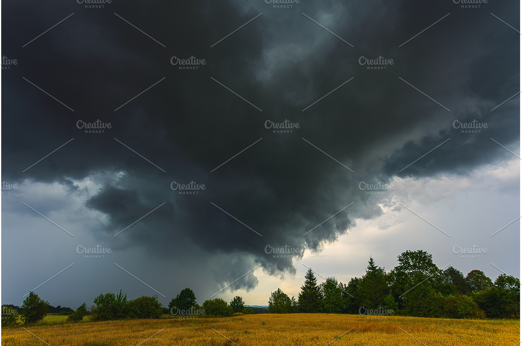Dramatic storm clouds in the sky, a Nature Photo by Lukas Jonaitis SHOP