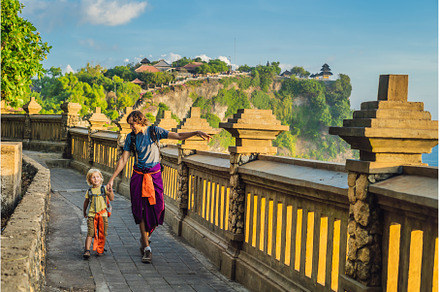 Dad and son travelers in Pura Luhur, a Nature Photo by Elizaveta Galitskaya