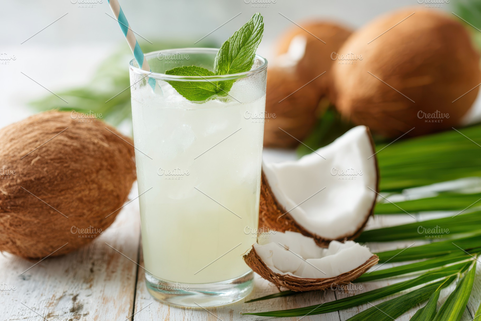 Tropical drink on a sunny beach, a Food & Drink Photo by AlyaAnd