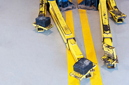 Part of car lifter post in tire shop. Automotive and vehicle con, an Industrial Photo by Ministocker