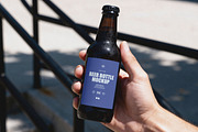 Amber Beer Bottle in Hand Mockup, a Product Mockup by Design Squad (Thumbnail 3 of 4)