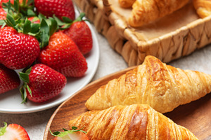 Delicious french croissants with fresh strawberries and honey fo, a Food & Drink Photo by Olena Rudo