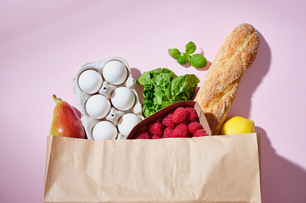 Full paper grocery bag with healthy products. Organic food conce, a Food & Drink Photo by Asya Nurullina