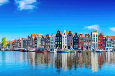Colorful houses on the bank of the c, a Photo by Iftikhar Alam