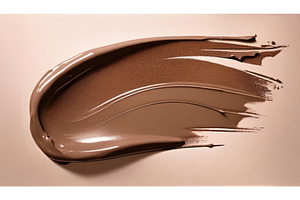 Mocha-colored paint smear with a, an Abstract Photo by Igor Tichonow