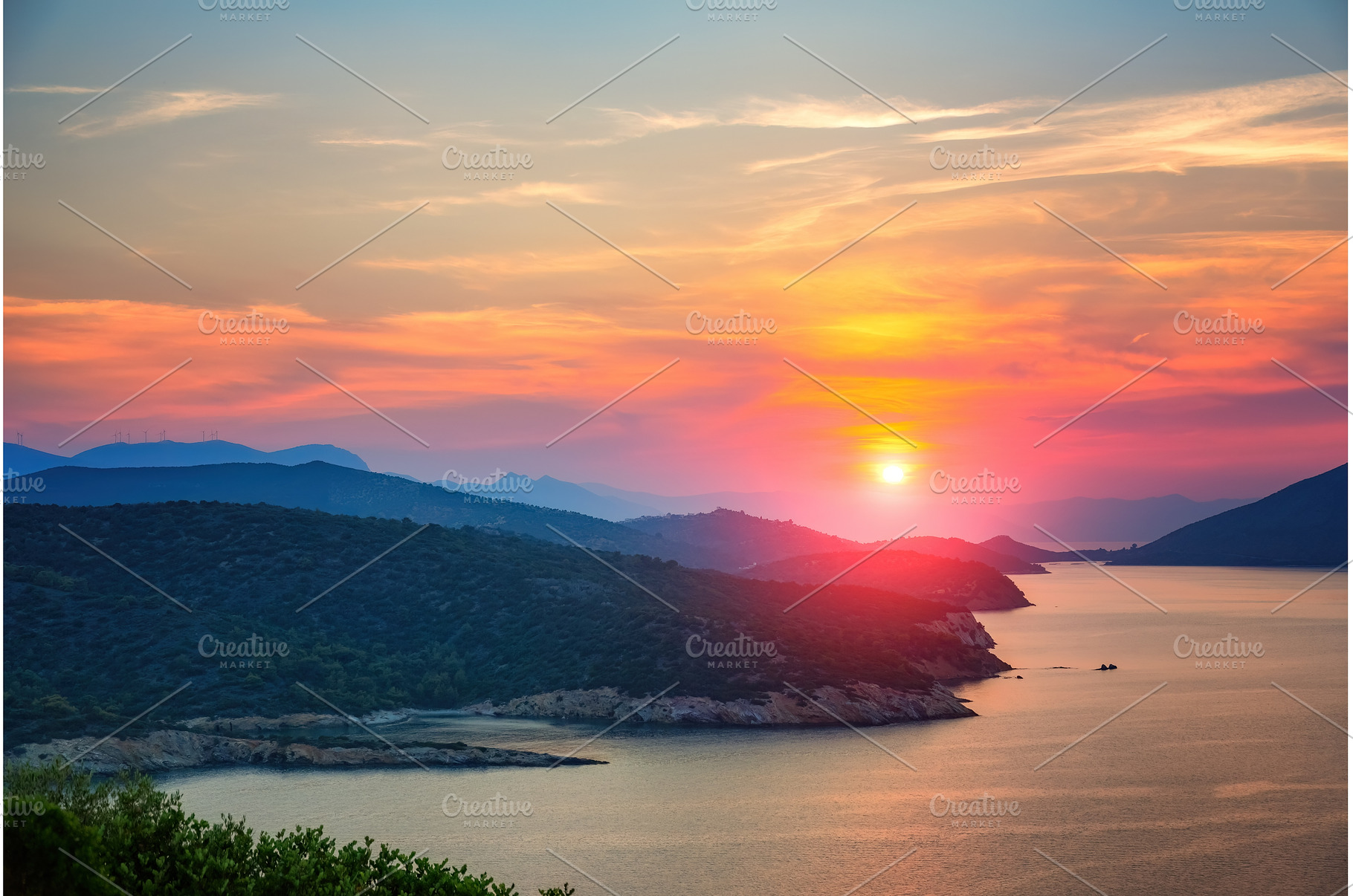Sunset over sea in Greece, a Nature Photo by sborisov