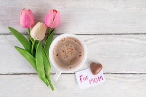 Mother’s Day breakfast background featuring croissant, strawberr, a Holiday Photo by Rimma