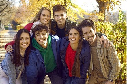 Positive young friends posing for, a Person Photo by StudioRomantic