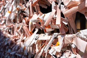 Omikuji paper fortunes at Hokoku Shrine in Osaka, Japan, a Background Photo by GoodGoods