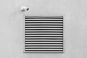 Wall with basement window and cctv, an Architecture Photo by BOOCYS