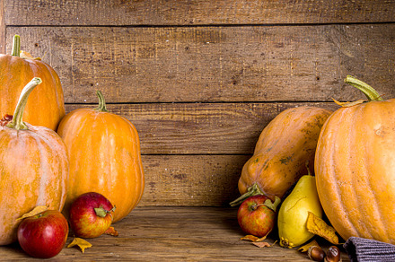Autumn pumpkins on wooden autumn background, a Food & Drink Photo by Rimma