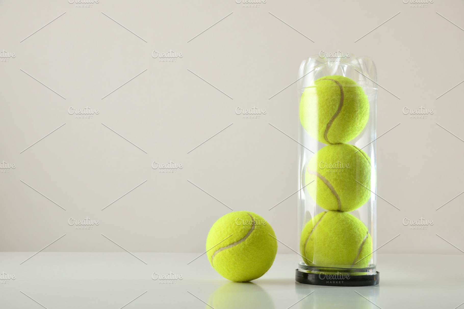 Stacked Tennis Balls in Clear Tube, a Sports & Recreation Photo by Davizro's Market