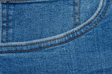 Blue jeans front pocket, close up, a Background Photo by ndanko
