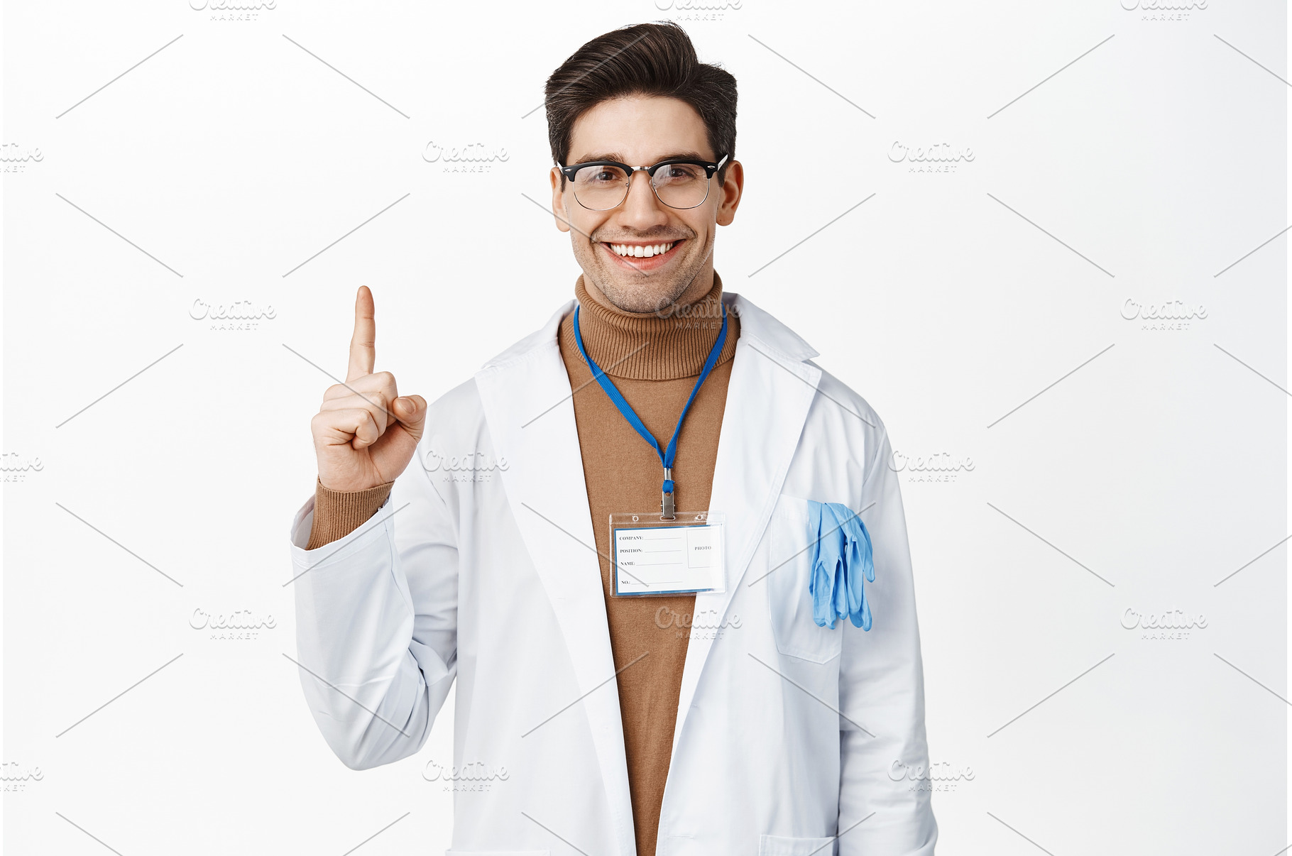 Smiling healthcare worker in robe, a Health & Medical Photo by Cookie Studio
