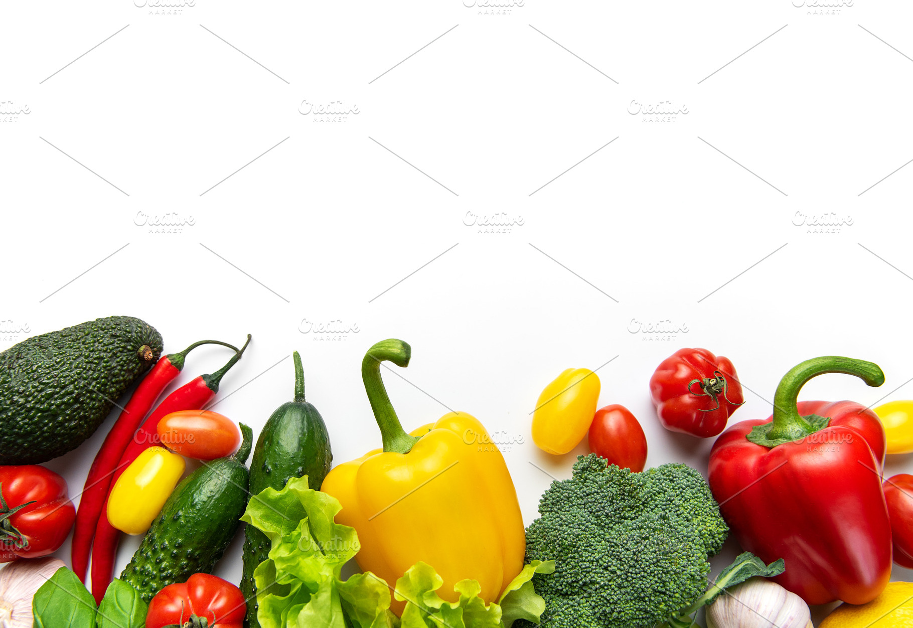 Fresh organic vegetables forming a colorful healthy food border, a Food & Drink Photo by Olena Rudo