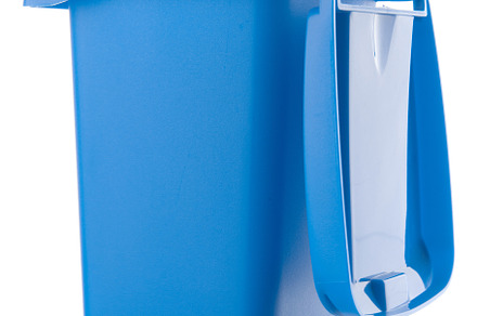 Plastic blue trash can isolated on white background