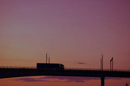 Silhouette of a bridge over water ov stock photo containing cityscape and, a Transportation Photo by oleghz