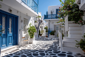 Charming white buildings street, a Photo by Beautiful things