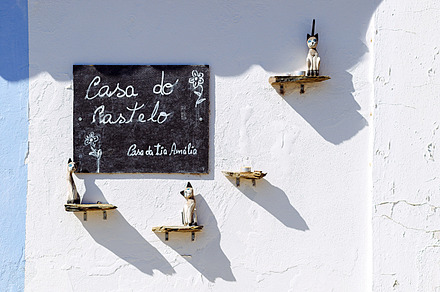 Detail of decorated wall with cats stock photo containing door and old, an Architecture Photo by Shootdiem