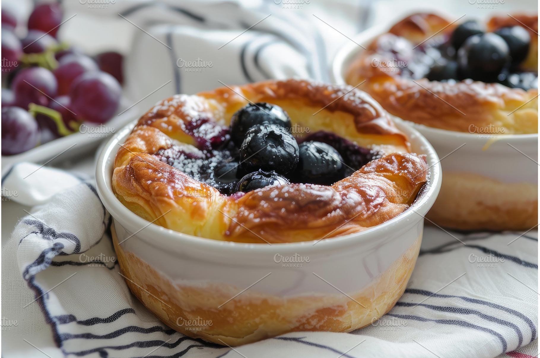 Freshly baked blueberry danishes on, a Food & Drink Photo by Ylivdesign