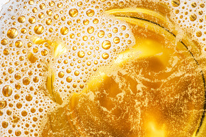 Glass of beer. Top view of lager beer or light beer., a Food & Drink Photo by Volff