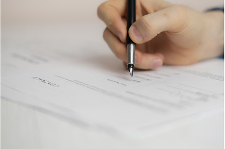 a person's hand holding a pen and, a Business Photo by Mikee's stuff