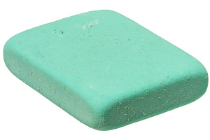 Close up of one green rectangular eraser on isolated background, an Abstract Photo by ndanko