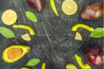 Fresh organic avocado on dark old, a Food & Drink Photo by Elizaveta Galitskaya