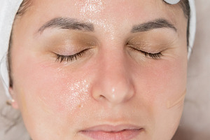 Woman face microcurrent stimulation procedure, a Person Photo by Photo Drive Studio