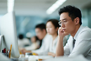 Asian man in office setting looks, a Business Photo by MistyDay