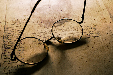 Classic spectacles on old paper featuring ancient, antique, and antiques