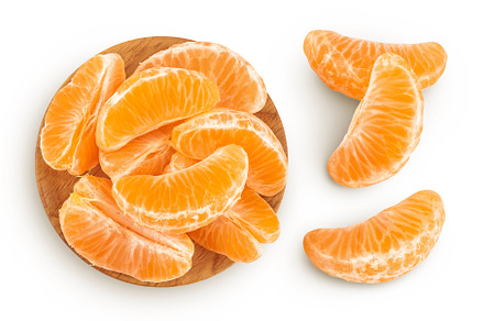 Tangerine or clementine slices in, a Food & Drink Photo by NataPhoto