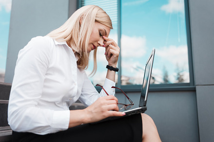 Tired office worker is sitting, a Photo by borodai94