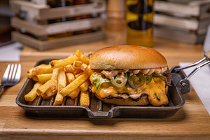 Delicious cheeseburger with french fries, a Photo by Grafvision photography
