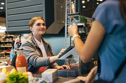 Smiling female cashier