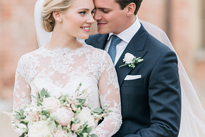 Bride and groom embracing outdoors on wedding day, celebrating l, a Person Photo by Studio ANNA