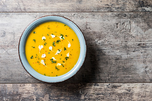 Creamy pumpkin soup with herbs and cream, a Food & Drink Photo by etorres69