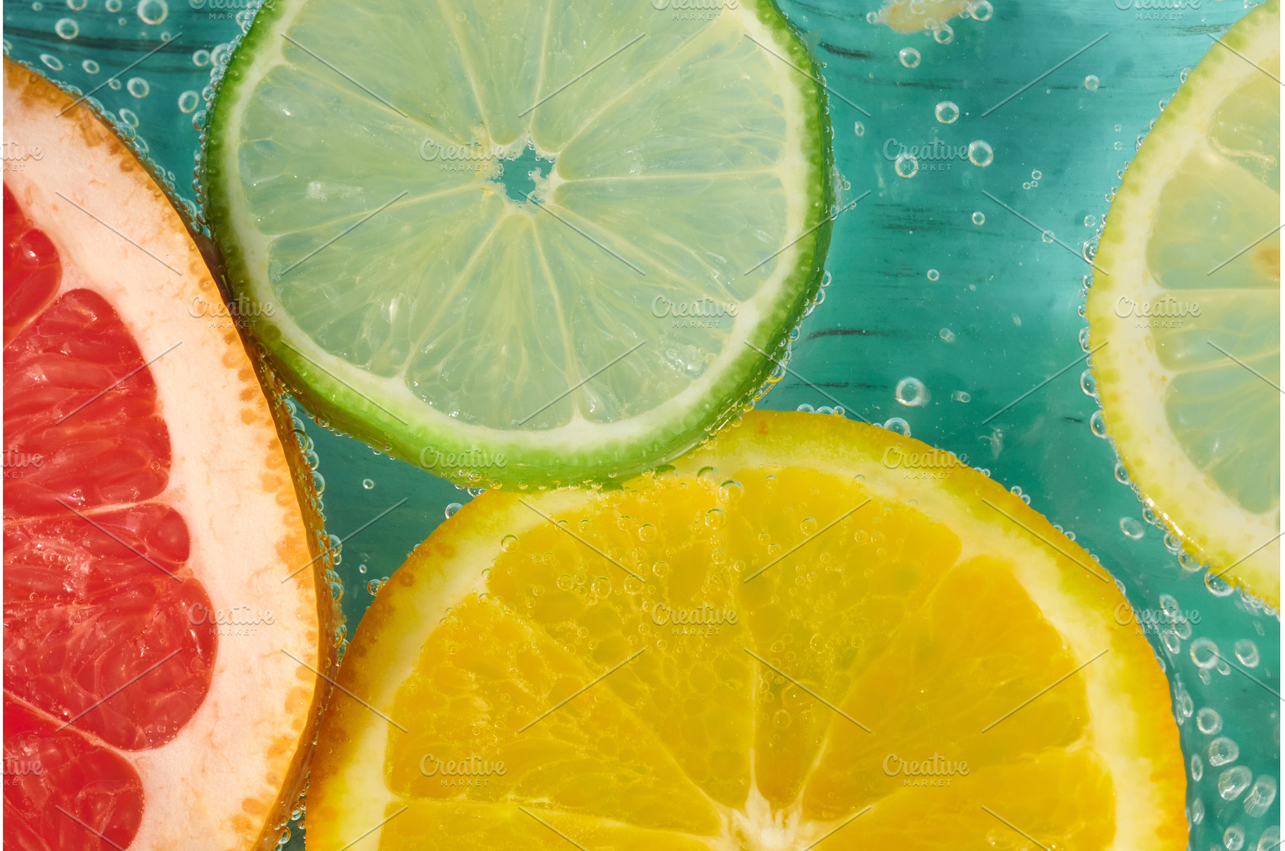 Fresh citrus fruits in sparkling, a Food & Drink Photo by darksoul72