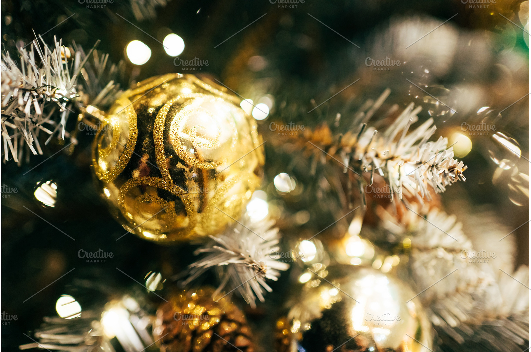 Golden christmas ornament decorating, a Holiday Photo by Anna Efetova