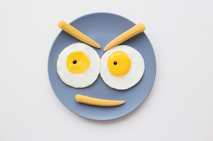two beautiful eggs on a plate, a Food & Drink Photo by Artsaba Family
