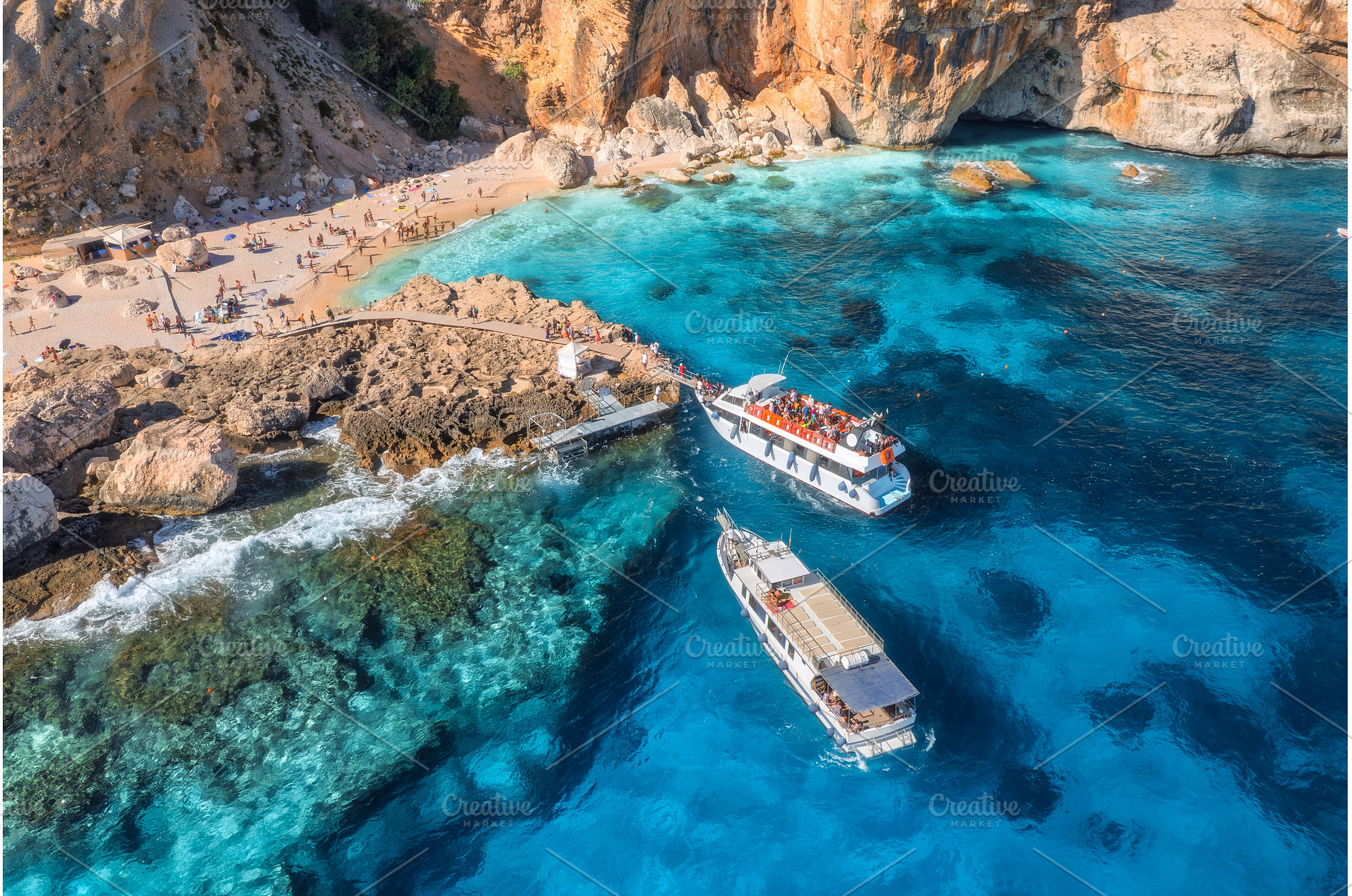 Aerial view of yacht and sandy beach, a Nature Photo by den-belitsky