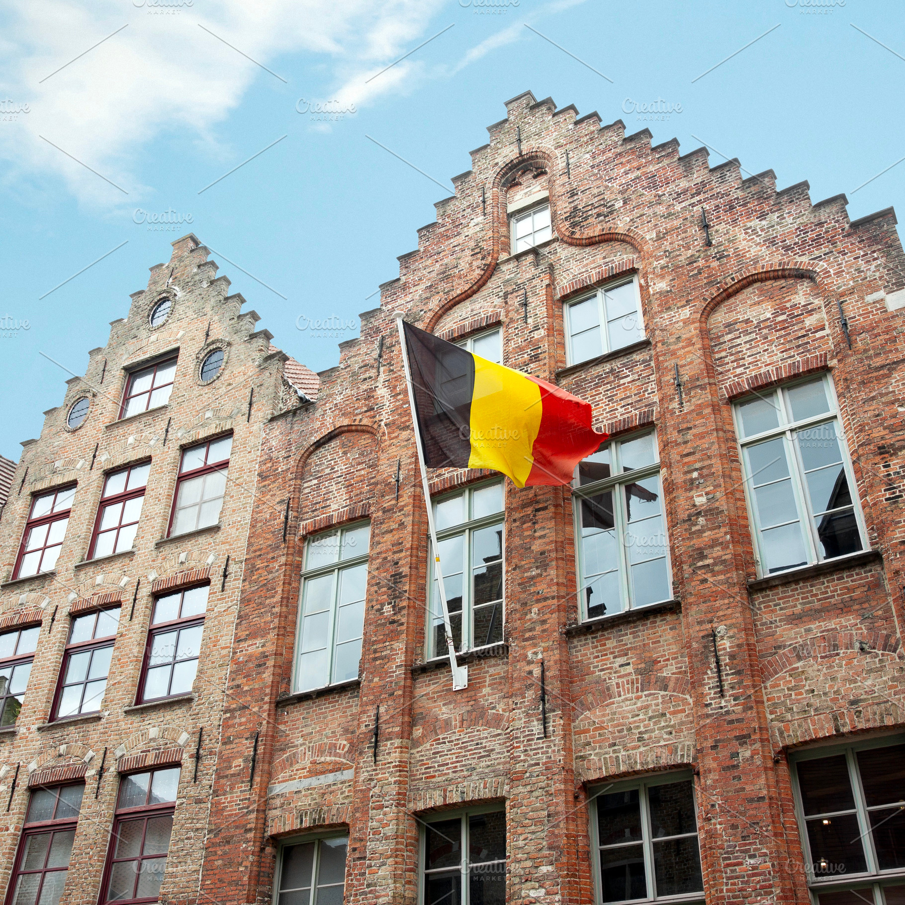 Belgian national flag on a building, an Architecture Photo by BOOCYS