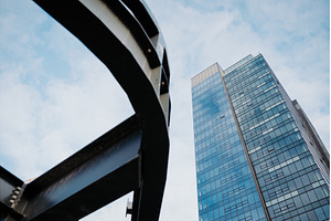 Low-angle view of modern skyscraper, an Architecture Photo by HalfPoint