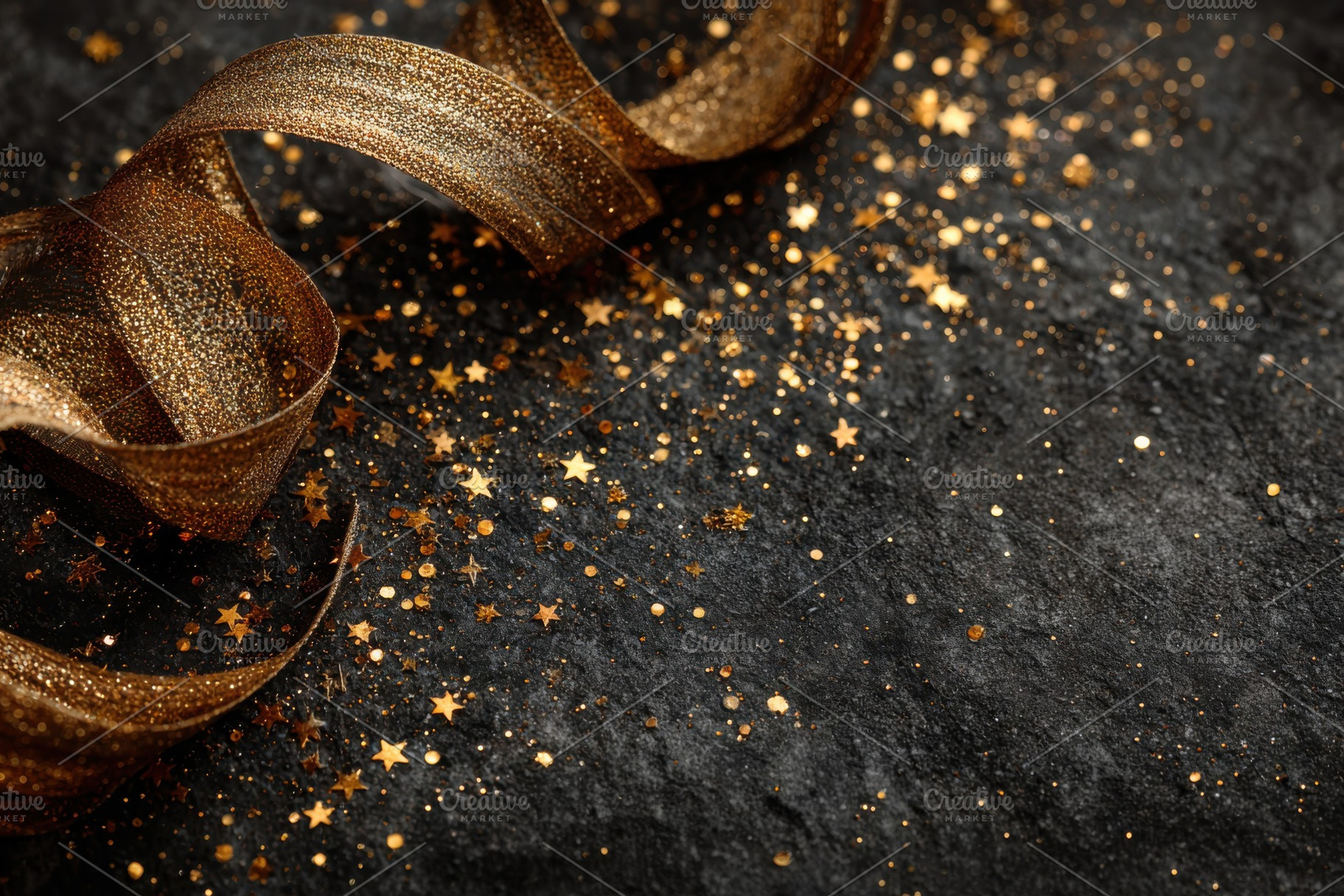 Gold ribbon and glitter on black bac, a Photo by Pixeness Studio