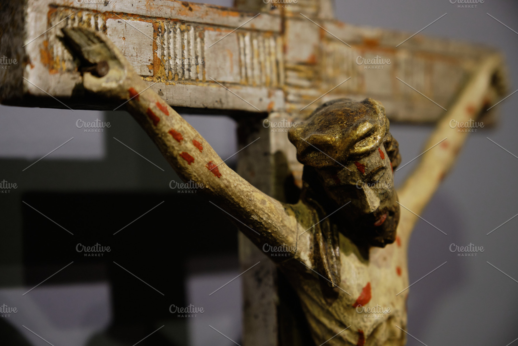 Ancient hand-carved wooden crucifix of Jesus Christ. Antique religious sculptur, an Arts & Entertainment Photo by Rohan Photography