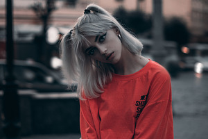 Stylish western girl with ashen hair